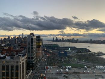 High angle view of buildings against sky during sunset