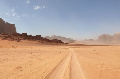 Scenic view of desert against sky