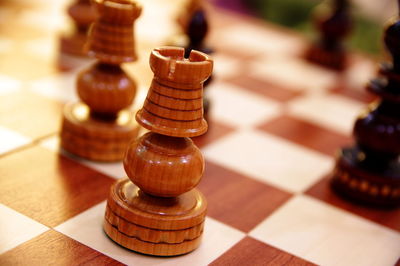 Close-up of chess pieces on table