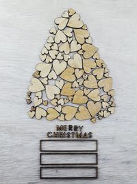 Christmas decorations on wooden wall