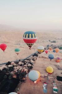 Hot air balloons on field