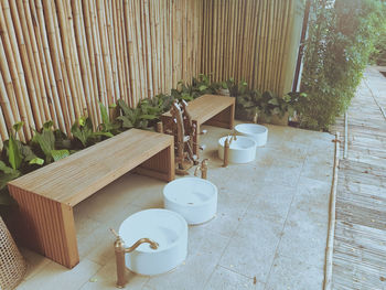 High angle view of empty chairs on table