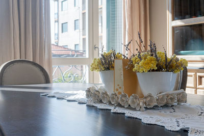 Potted plant on table at home