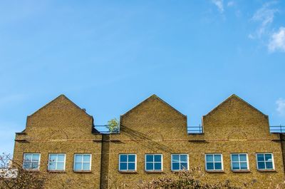 Low angle view of houses against sky