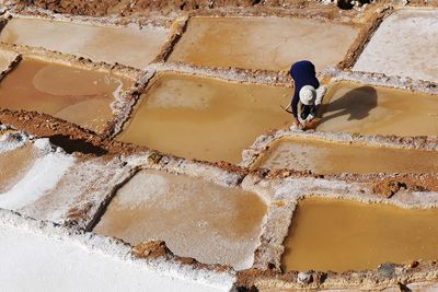 High angle view of salt pond in peru