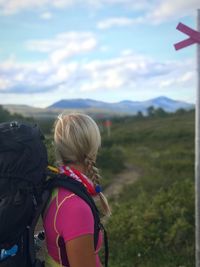 Rear view of woman looking at mountains
