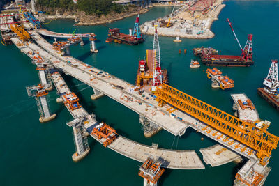 High angle view of commercial dock by sea