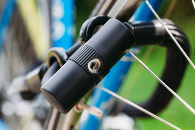 Close-up of lock on bicycle wheel