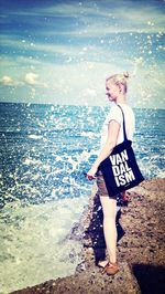 Woman standing on beach