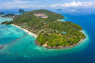 Phi phi island and resort and tourist boat at krabi thailand aerial view