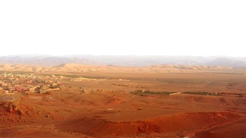 Scenic view of desert against clear sky