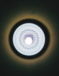 Low angle view of illuminated lamp