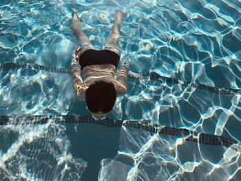 High angle view of swimming in pool