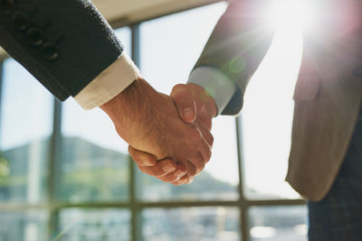 Cropped image of business colleagues shaking hands