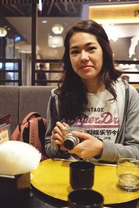 Portrait of woman in restaurant