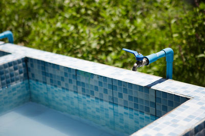 View of swimming pool against trees