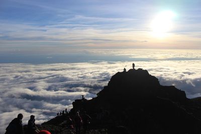 The sun rises at the top of mount rinjani