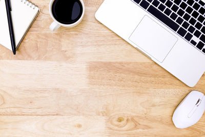 High angle view of coffee cup on table