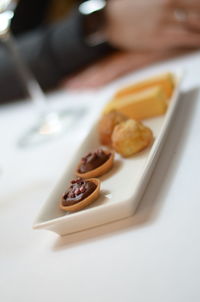 High angle view of dessert in tray on table