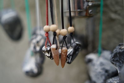 Close-up of decoration hanging on metal for sale