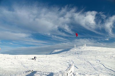 Scenic view of snowcapped mountain against sky