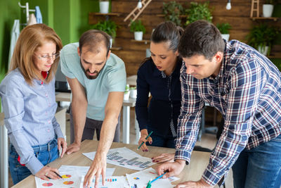 Business colleagues working at office