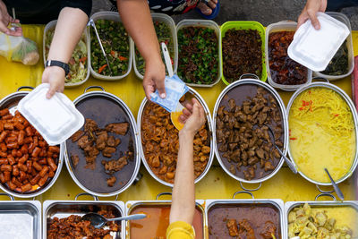 High angle view of woman preparing food