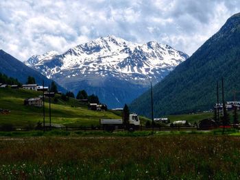 Scenic view of snowcapped mountains against sky