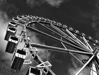 Low angle view of crane against sky