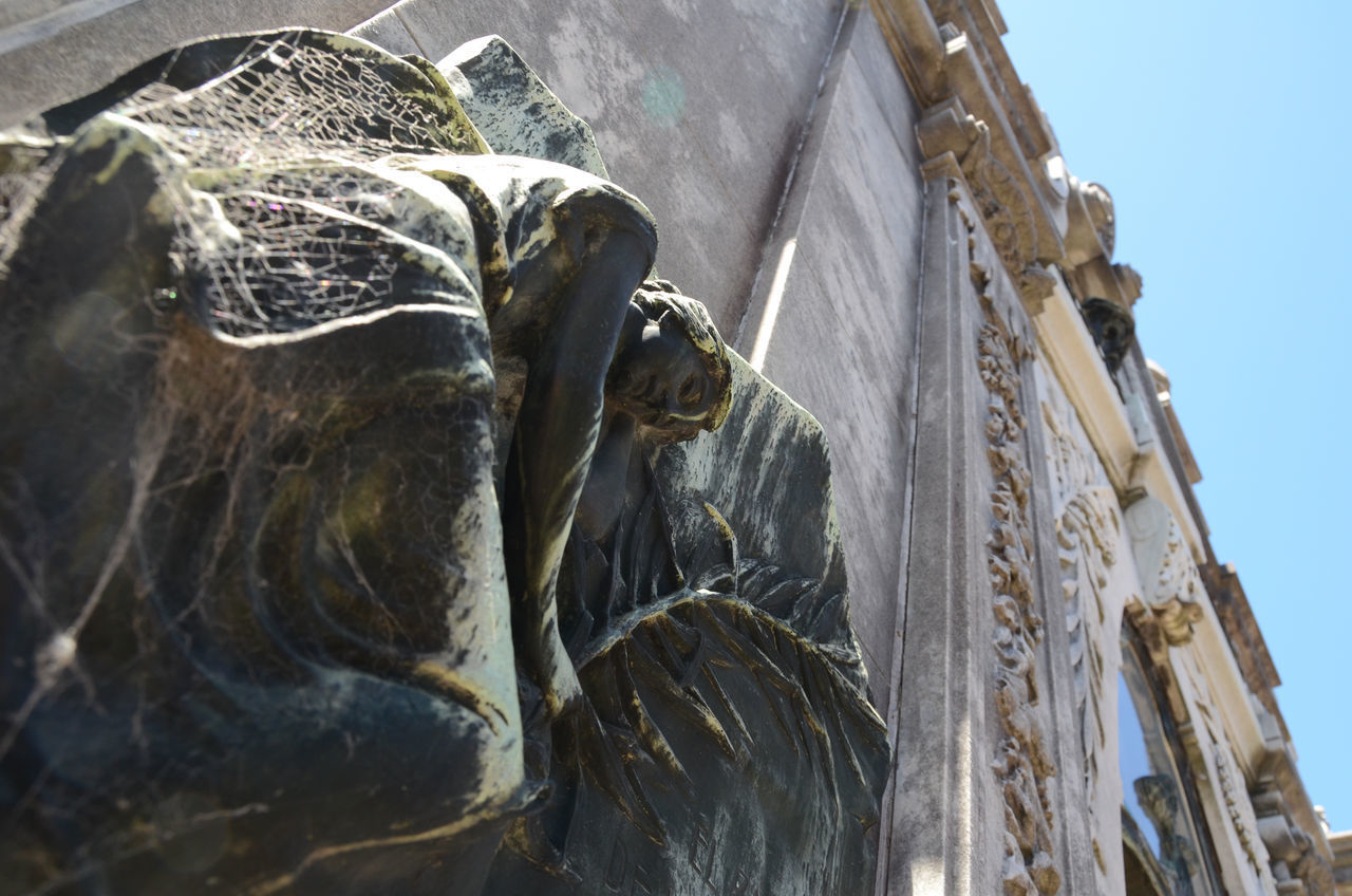 LOW ANGLE VIEW OF STATUES