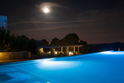 View of swimming pool at night