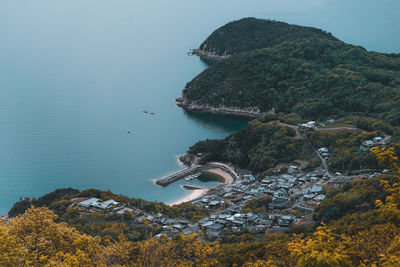 High angle view of bay against clear sky