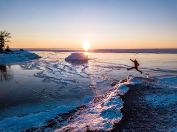 Scenic view of sea against sky during sunset