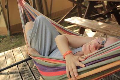 Low section of woman in hammock