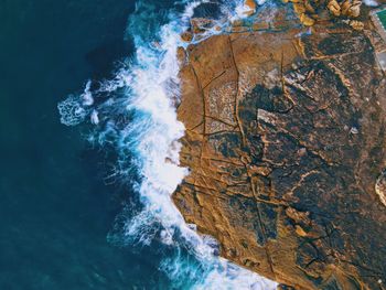 High angle view of rock formation on sea shore