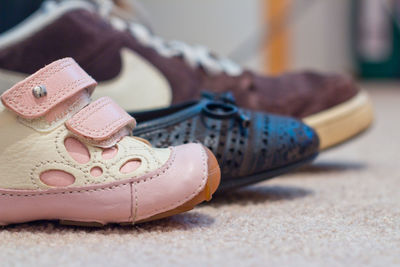 Close-up of shoes on table