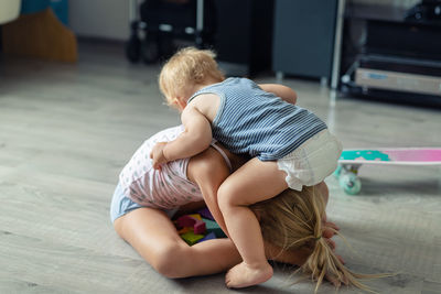 Siblings fighting at home