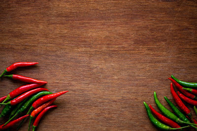 High angle view of chili peppers on table