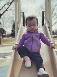 Cute girl playing in playground