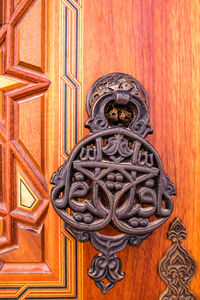 Close-up of ornate door knocker