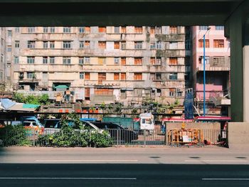 Residential buildings by street in city