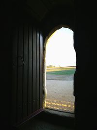 Sea seen through arch window