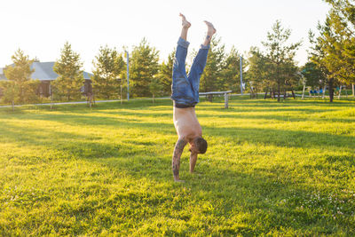 Full length of man jumping in park