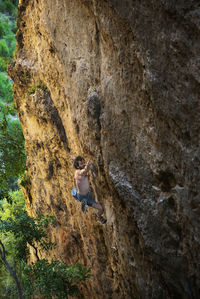 Man climbing rock