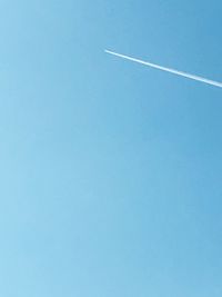 Low angle view of vapor trail in sky