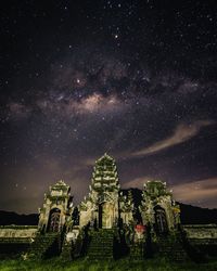 Low angle view of temple against sky at night