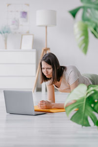 Woman exercising at home