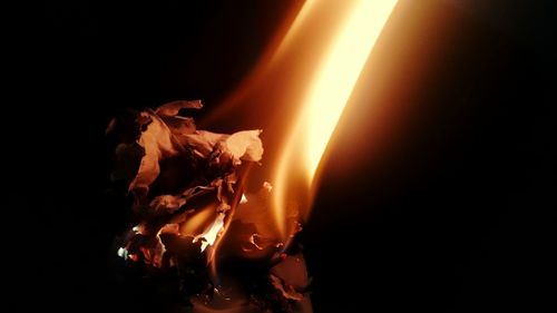 Close-up of fire in the dark