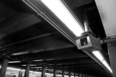 Low angle view of illuminated lights on ceiling