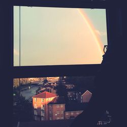 Cityscape against sky during sunset